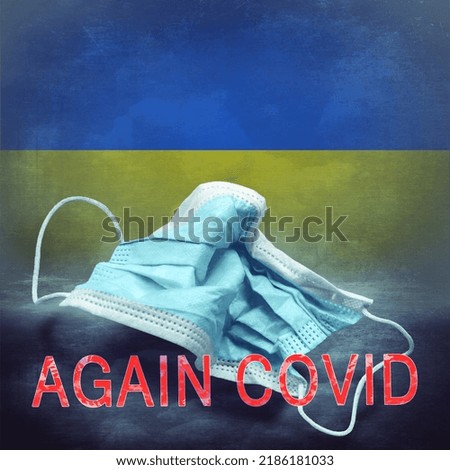 Lettering Again Covid and a crumpled medical mask on the flag of Ukraine. Return of the coronavirus. New jump in incidence. Omicron and Dedta strain. Danger of a viral infection. Medical concept