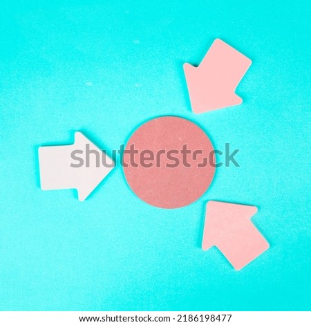 Arrows pointing to a circle with copy space, having a target, planning a strategy for business