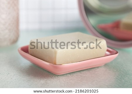 Handmade soap on the rose soap-dish Royalty-Free Stock Photo #2186201025