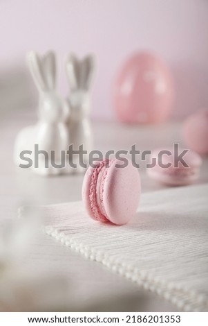 Pink macaroon with white easter decoration