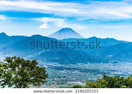 Cityscape from Yamanashi City, Yamanashi Prefecture, Japan and Mt. Fuji Royalty-Free Stock Photo #2186205315