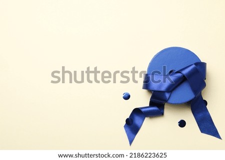 Concept of gift, gift box on beige background