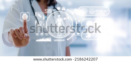female doctor hand pointing touching data digital icon hologram and medical graphic diagram in laboratory lab on hospital background, virus outbreak, coronavirus, covid-19, medical technology, concept