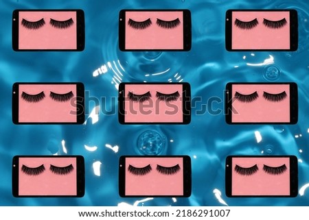 mobile phone with eyelashes copied on blue water background, creative art modern design