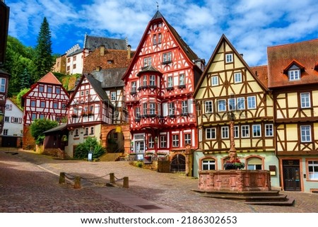 Colorful gothic style half-timbered houses in historical Old town of Miltenberg, Bavaria, Germany. Miltenberg is a popular travel destination near Frankfurt am Main, Germany. Royalty-Free Stock Photo #2186302653
