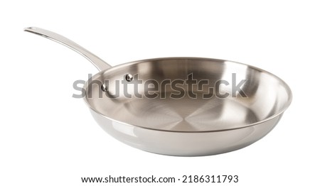 New stainless steel frying pan cutout. New skillet of 18 10 chrome nickel steel isolated on a white background. Empty inox frypan for frying, searing, and browning food. Modern metal cookware.  Royalty-Free Stock Photo #2186311793