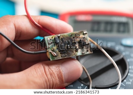 Short circuit and burned of electronic LED driver circuit. Royalty-Free Stock Photo #2186341573