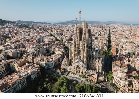 Aerial view shot of La Sagrada Familia Basilica Barcelona at sunrise.  Royalty-Free Stock Photo #2186341891