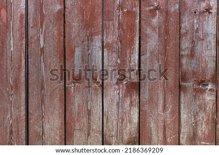 background in the form of a plank wall with burgundy paint. High quality photo