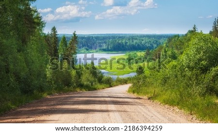 Beautiful observation deck Yarnema descent in Arkhangelsk region, view from the hill to the road, forest and Onega river near the village of Yarnema, Nature of the north in summer Royalty-Free Stock Photo #2186394259