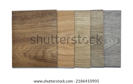 palette of modern vinyl flooring tile collection. stack of samples of vinyl sheet catalog in multi color and texture for customer selection, isolated on background with clipping path. Royalty-Free Stock Photo #2186410905