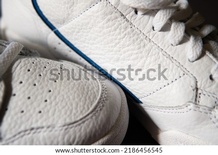 white sneakers as background for label