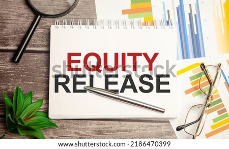 Equity Release words on notepad and charts
