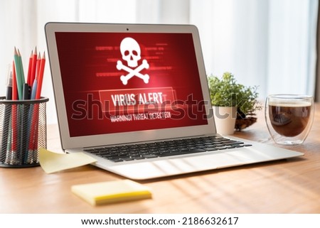 Virus warning alert on computer screen detected modish cyber threat , hacker, computer virus and malware Royalty-Free Stock Photo #2186632617
