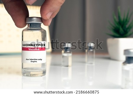 Doctor take a vial of monkeypox vaccine