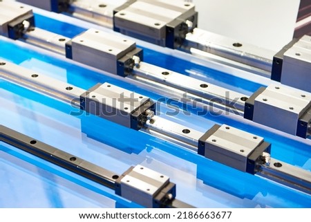 Linear steel rails for CNC machines Royalty-Free Stock Photo #2186663677