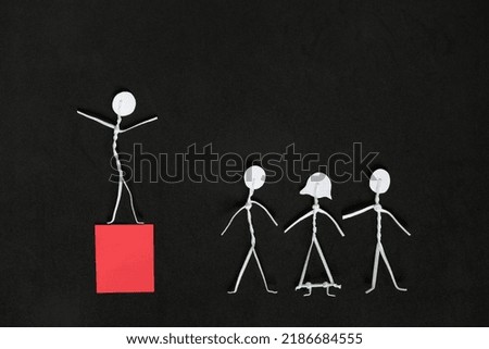 Good leadership concept. Human stick figure as leader on red platform.
