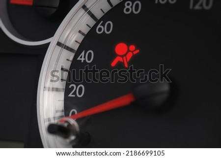 Closeup view of dashboard with warning icon check airbag system in car Royalty-Free Stock Photo #2186699105