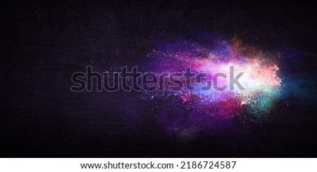 Explosion of colored powder . Mixed media Royalty-Free Stock Photo #2186724587