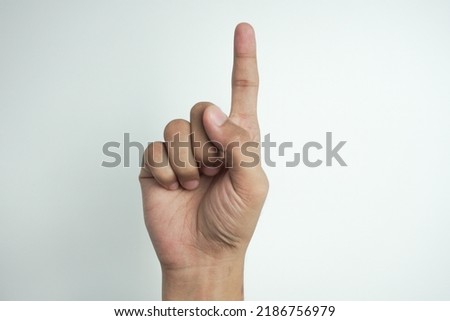 man's hand isolated on white background. Isolated image of human hand sign or symbol in white background