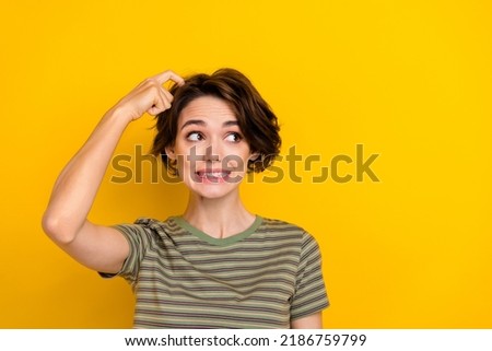 Photo of young pretty woman scratching head oops forgot credit card cafe looking empty space isolated on bright yellow color background Royalty-Free Stock Photo #2186759799