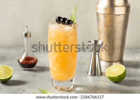 Cold Refreshing Three Dots and a Dash Cocktail with Rum and Pineapple