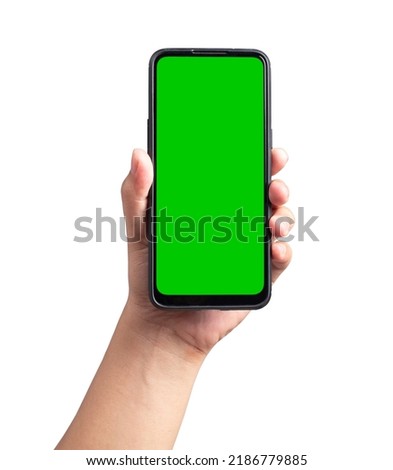 Asian man hand holding mobile phone with green screen