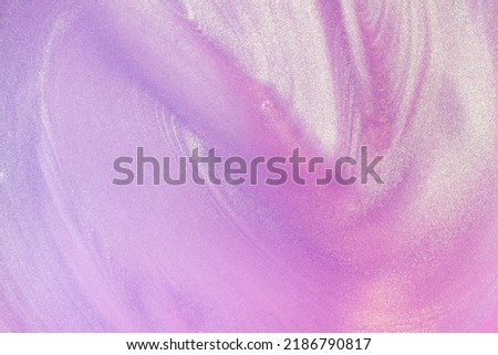 Glowing pink purple waves mermaid shimmering cosmetic miracle texture gel body spray Royalty-Free Stock Photo #2186790817