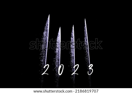 Happy new year 2023 purple fireworks rockets new years eve. Luxury firework event sky show turn of the year celebration. Holidays season party time. Premium entertainment nightlife background