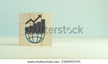 Multinational corporation (MNC), business strategy concept. Standardizing products and services around the world  to gain efficiency. Vertical, horinzontal expansion strategy. New markets, opportunity Royalty-Free Stock Photo #2186901945