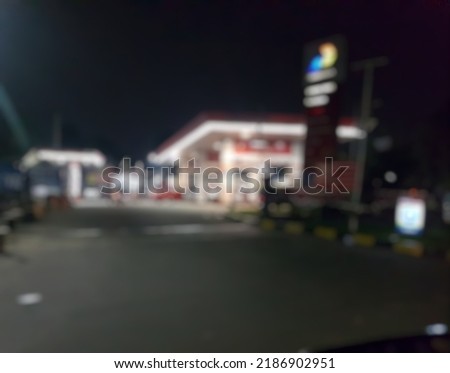 abstrack blurred of gas station in early morning.