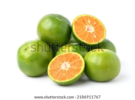 Tangerine orange with cut in half isolated on white background. Clipping path. Royalty-Free Stock Photo #2186911767