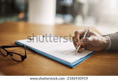 Lawyer hand showing paperwork for signing, agreement contract and settlement offer in law firm office. Closeup of legal advisor, attorney and paralegal pointing with pen to accept or close court