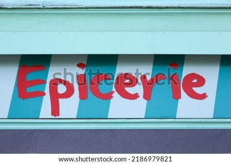 Convenience store sign called epicerie in French language