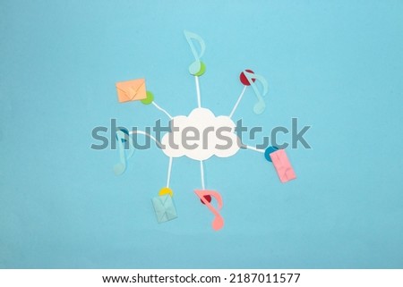 cloud where digital content is read, music and messages are stored in the cloud, creative art design, techno art blue background