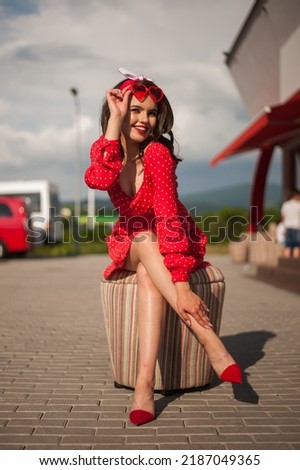 Young girl dressed in pin up style