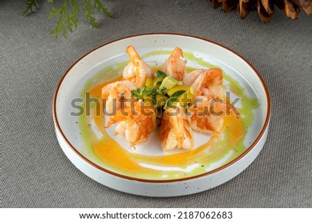 Shrimp and avocado salad. Fine dining restaurant, perfect display. Royalty-Free Stock Photo #2187062683