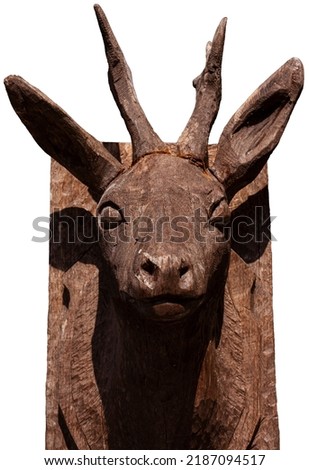Head of a deer made from wood isolated on white background