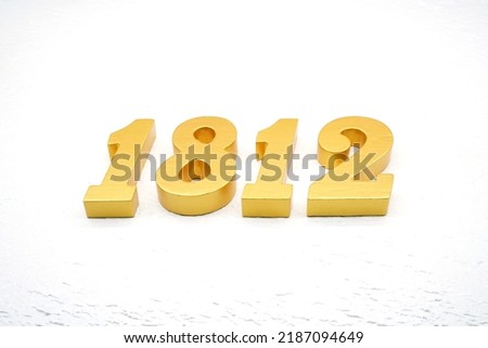 Number 1812 is made of gold painted teak, 1 cm thick, laid on a white painted aerated brick floor, visualized in 3D.                                