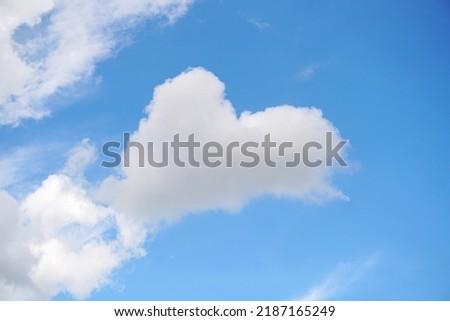 Sky with cloud, Imagination like a heart, nice gray sky on sun light white clouds at noon time for background.