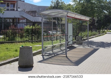 empty glass bus stop  in city
