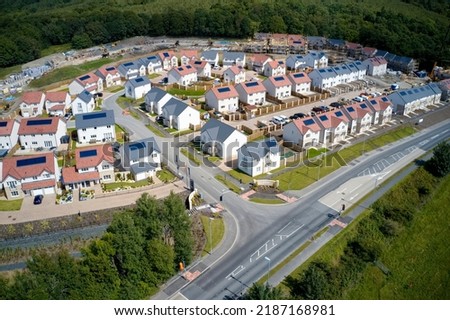 New housing development building houses for increased demand in rural areas Royalty-Free Stock Photo #2187168981