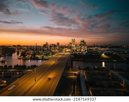 Milwaukee skyline overlooking the Hoan Bridge during sunset