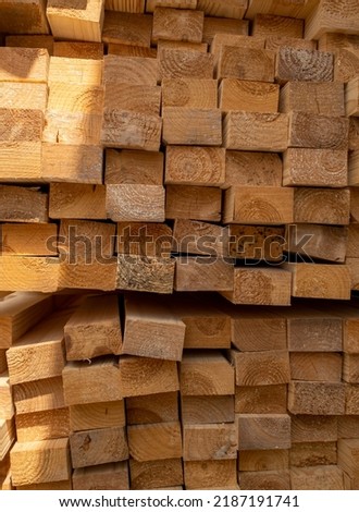 stacked wood. Timber construction material. Royalty-Free Stock Photo #2187191741