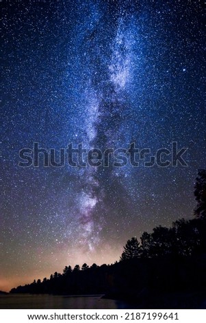 The Milky Way in the sky over a mountain ridge