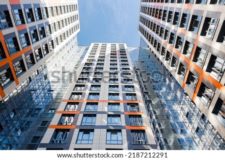 Photo of a residential high-rise building on a summer day
