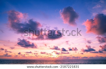 Landscape Long exposure of majestic clouds in the sky sunset or sunrise over sea with reflection in the tropical sea.Beautiful cloudscape scenery.Amazing light of nature Landscape nature background Royalty-Free Stock Photo #2187221831