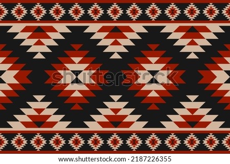 Carpet tribal pattern art. Geometric ethnic seamless pattern traditional. American, Mexican style. Design for background, wallpaper, illustration, fabric, clothing, carpet, textile, batik, embroidery. Royalty-Free Stock Photo #2187226355