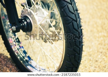 Off road Tyre motorcycle. Tires with special characteristics especially the deeper rubber grooves Helps in expelling water, mud, rubble, and soil.