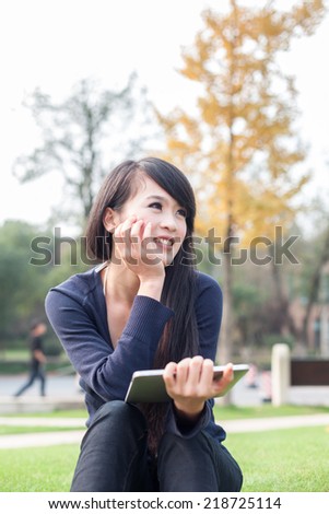 young asian woman with laptop 